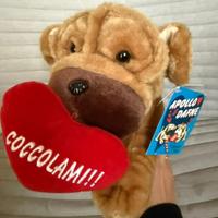 Peluche Cagnolino con cuore .