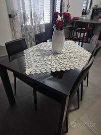 tavolo in vetro nero e 4 sedie calligaris