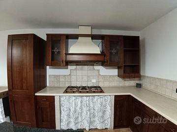 Cucina completa con fornello