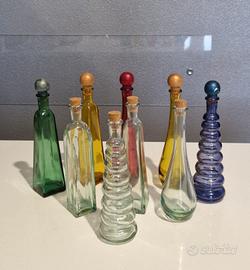 set di 9 bottigliette in vetrp