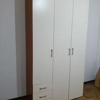 armadio a tre ante con cassetti