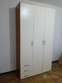 armadio a tre ante con cassetti