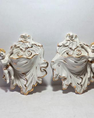 Coppia di acquasantiere da parete  ceramica putti