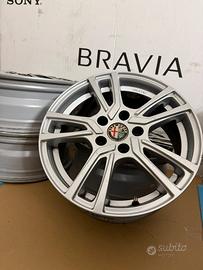 4 Cerchi in lega 16’’ PSW con tappi Alfa Romeo