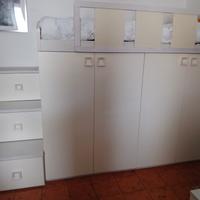 Letto a soppalco con armadio integrato 