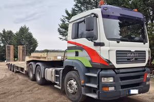 Trattore Man mezzo d'opera + carrellone de Angelis