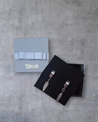 Orecchini stroili color argento a piuma