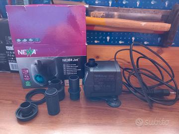 Pompa da fontana da giardino e presepe