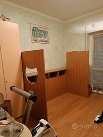 cameretta con tre letti