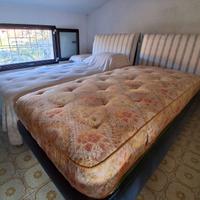 Letti in tessuto con testata