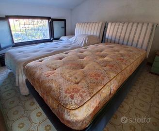 Letti in tessuto con testata