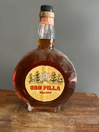 Bottiglia rara Orologio brandy ORO PILLA 1000CL.