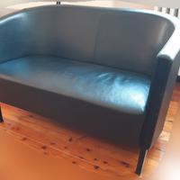 Poltrona Frau Intervista e divano Moroso in pelle