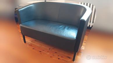 Poltrona Frau Intervista e divano Moroso in pelle