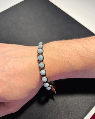Bracciale in cordino con pietre azzurre