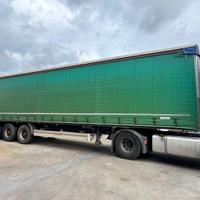 Semirimorchio Acerbi centinato rulliere