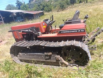 Cingolato New Holland 82 85 con carrellone