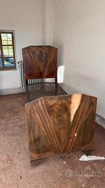 Antico letto in ferro