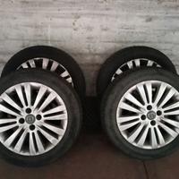 4 Cerchi in lega Opel Corsa + 4 pneumatici da neve