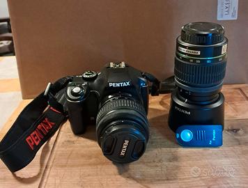 Pentax k-x con ob. 18-55mm e 50-200mm