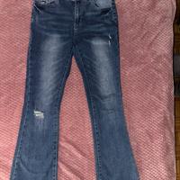 pantaloni a zampa a vita bassa