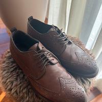 Derby con borchie A. Testoni