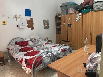 Stanza Via Di Tullio 12