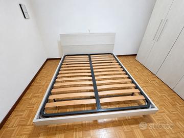 letto matrimoniale e grande armadio abbinato