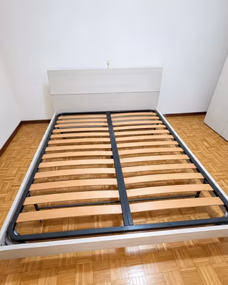 letto matrimoniale e grande armadio abbinato