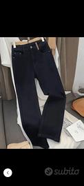 pantaloni divano cuscino cerniera giacca sedia 