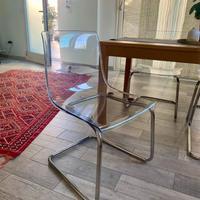 4 sedie in plexiglass trasparente