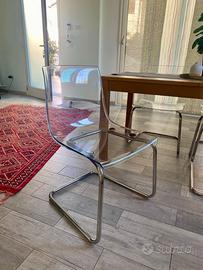 4 sedie in plexiglass trasparente