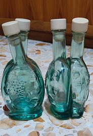 Bottiglie in vetro smerigliato e decorato 