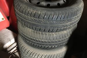 4 cerchi in ferro barra 14 completi gomme Punto
