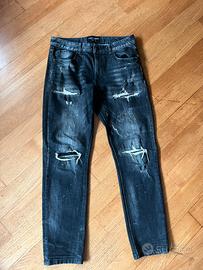 Jeans Nero Strappato Supply & Demand