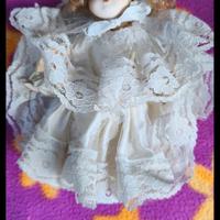 Bambola di porcellana dalla testa ai piedi tutta s