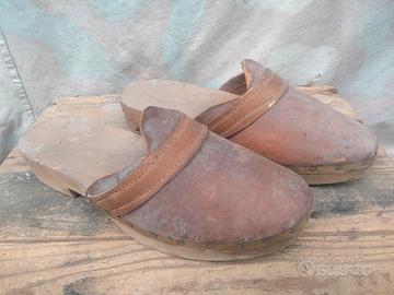 Antica arte rurale  zoccoli in legno e cuoio