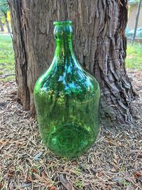 Damigiana in vetro verde vintage