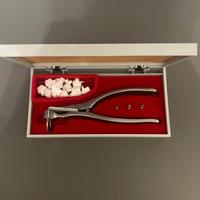 Pinza estrattrice denti