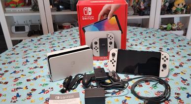 Nintendo Switch OLED Bianco+accessori e imballaggi