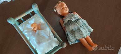 Bambolina e culla vintage/antichi