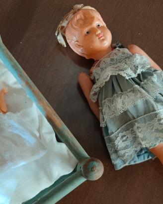 Bambolina e culla vintage/antichi