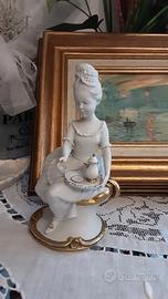 Statuetta in porcellana biscuit di Benacchio 