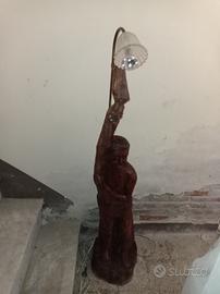Scultura con lampada