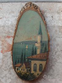 Pittura ad olio su parte di tronco di albero