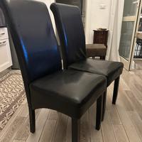 Sedie nere legno e ecopelle