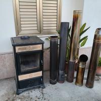 stufa a legna con tubi di collegamento 