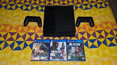 PS4 con controller e giochi