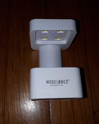 Mini lampada UV per unghie marca Modelones