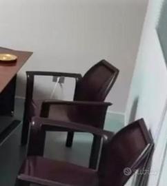 Sedia cuoio con braccioli